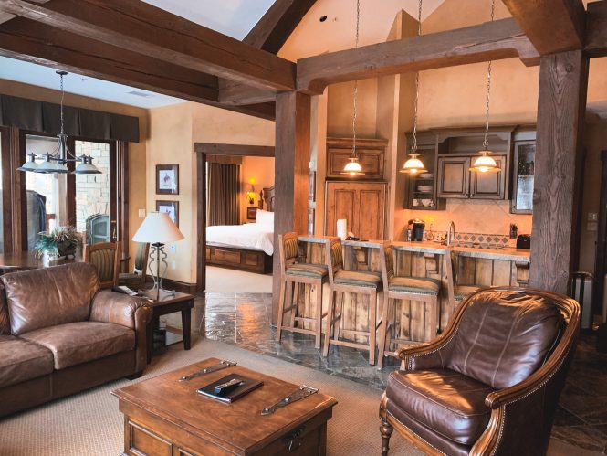 hotel villa living area overview in winter with log and wood framing